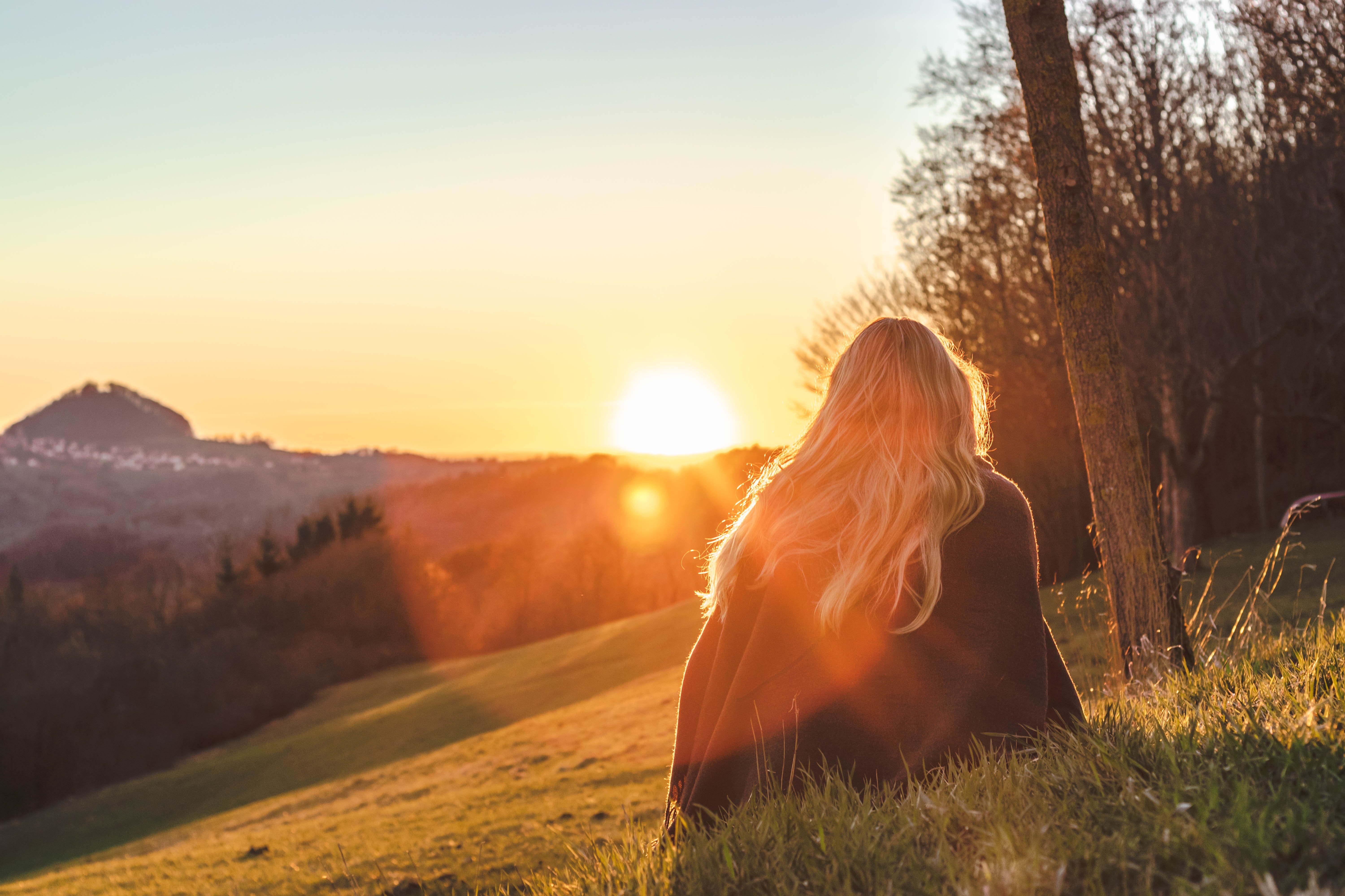 woman gazing at sunrise